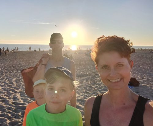 Familie zon strand